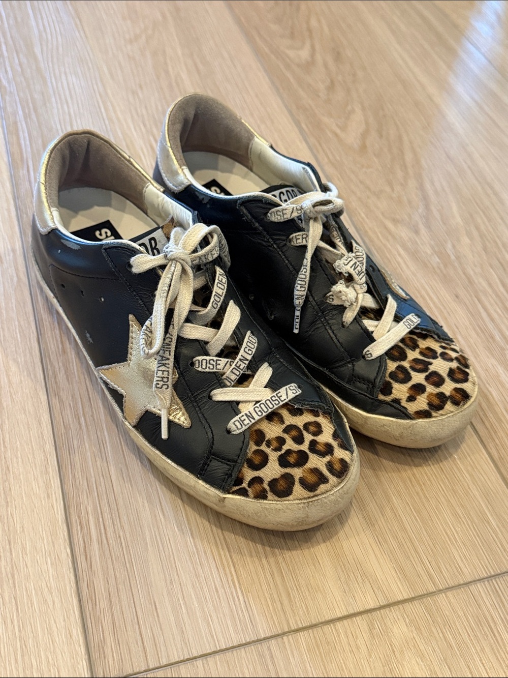 Golden Goose Super-Star Black Leather Sneakers with Gold Star and Leopard Print